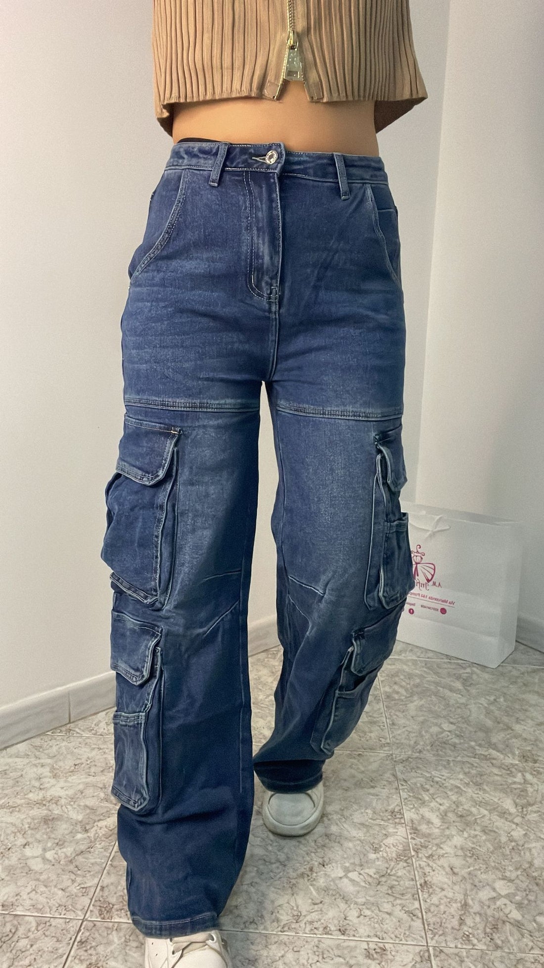 Jeans cargo con tasconi