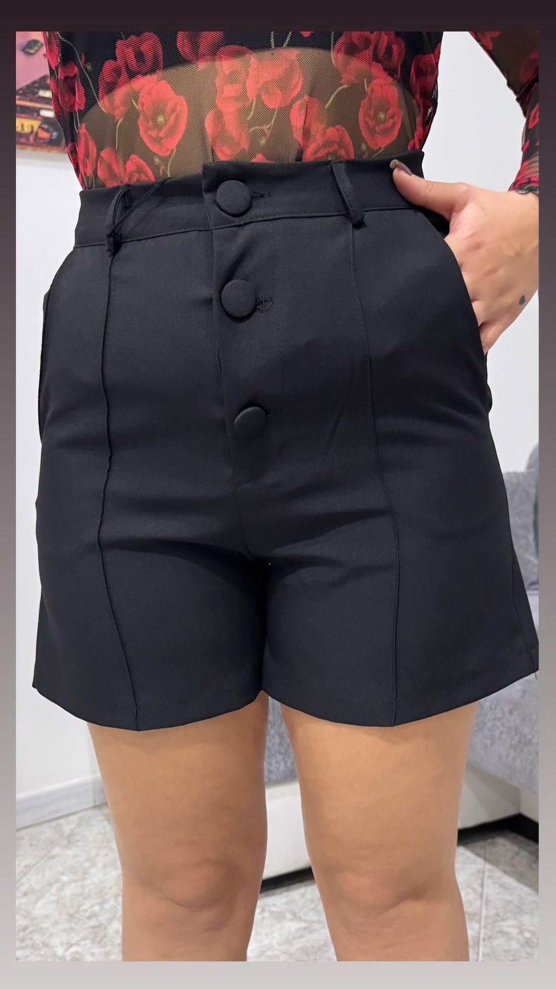 Shorts con bottoni